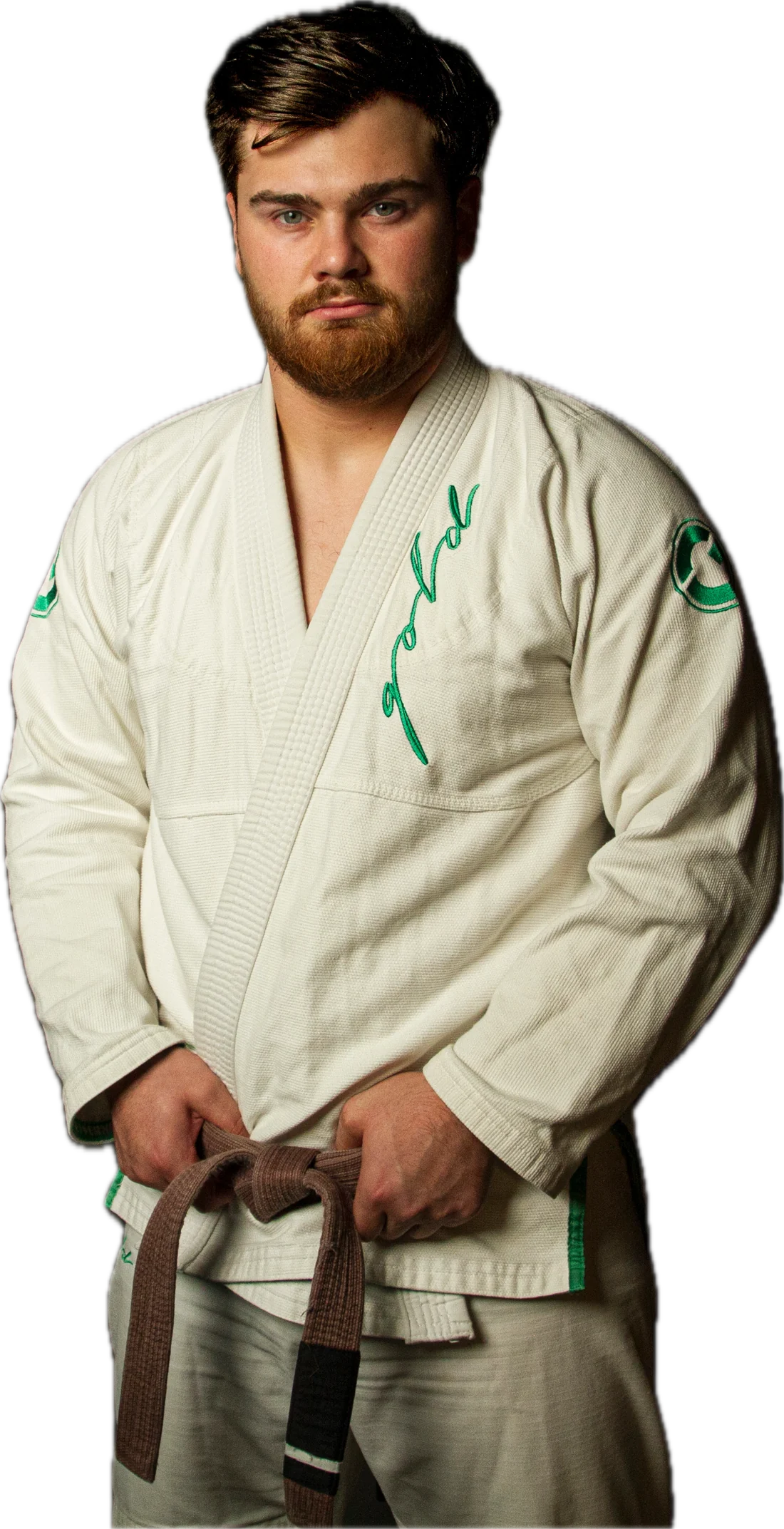 Max Kaufman in a gi and brown belt